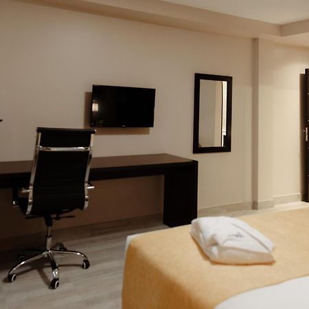 Hotel Batista Posadas Pokoj fotografie
